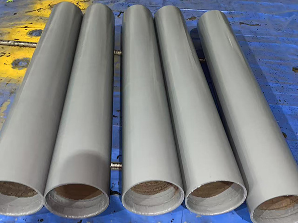 Wear-resistant overlay pipe